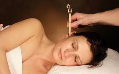 Ear Candling with Facial Manual Lymphatic Drainage utilizing Essential Oils